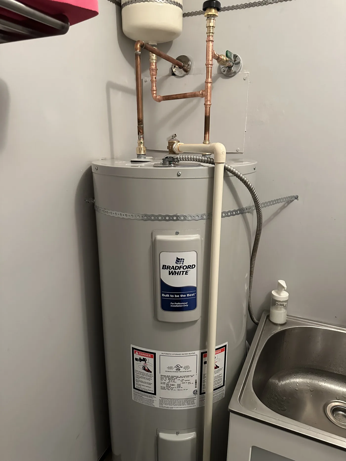 Bradford White hot water tank, piped clean and level