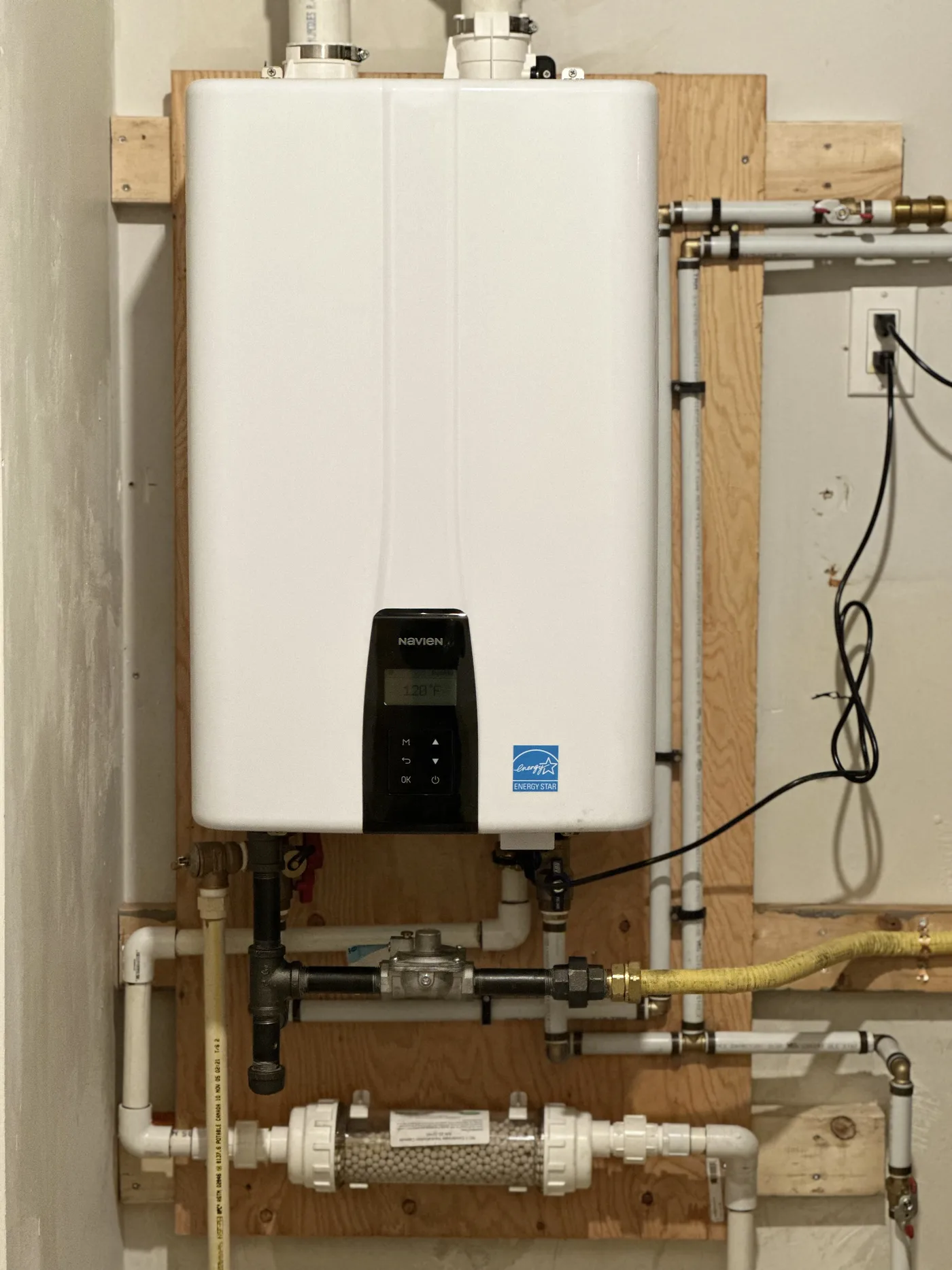Navien tankless water heater with tidy, serviceable piping