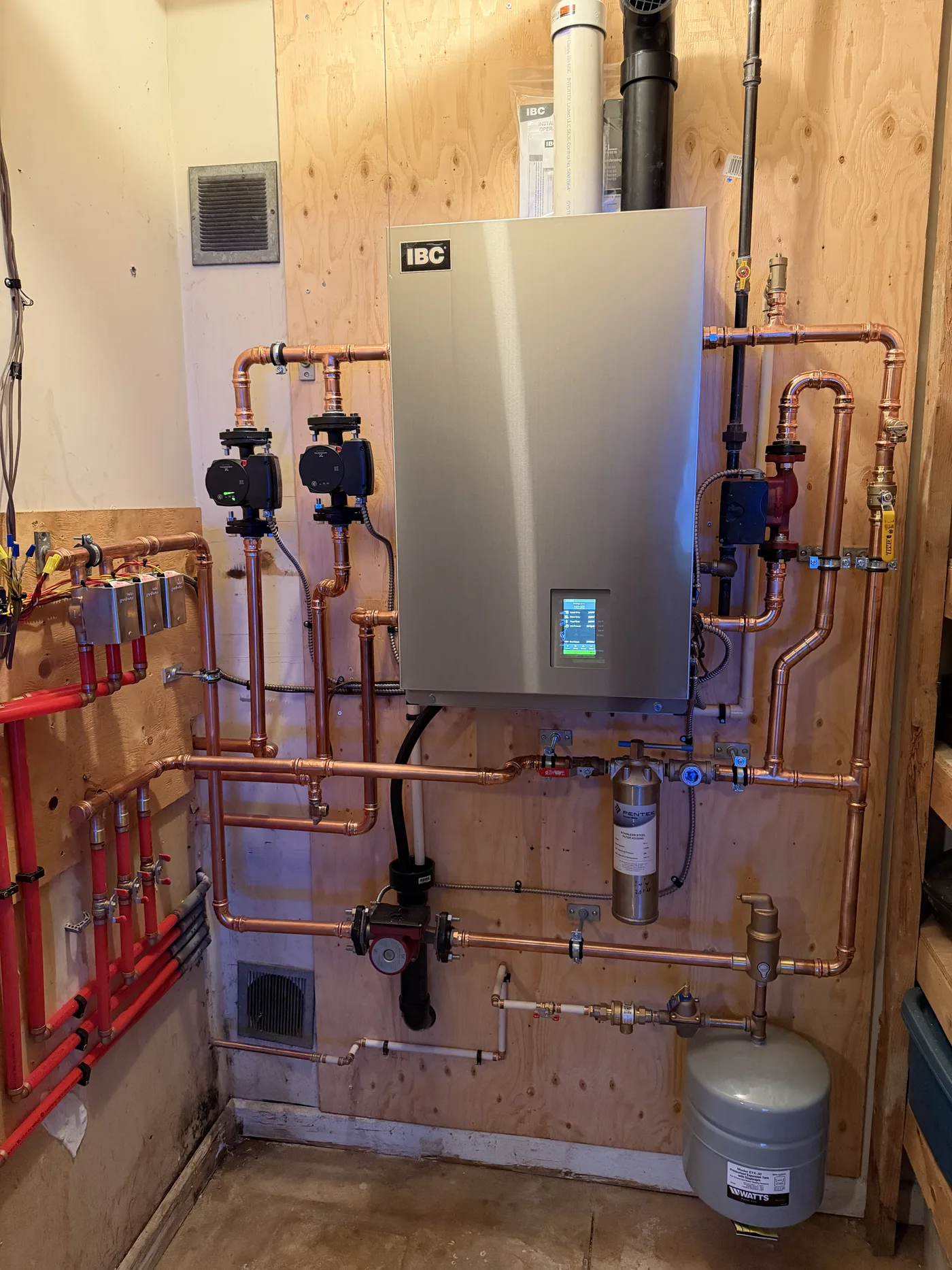 IBC wall-hung install with full copper manifold